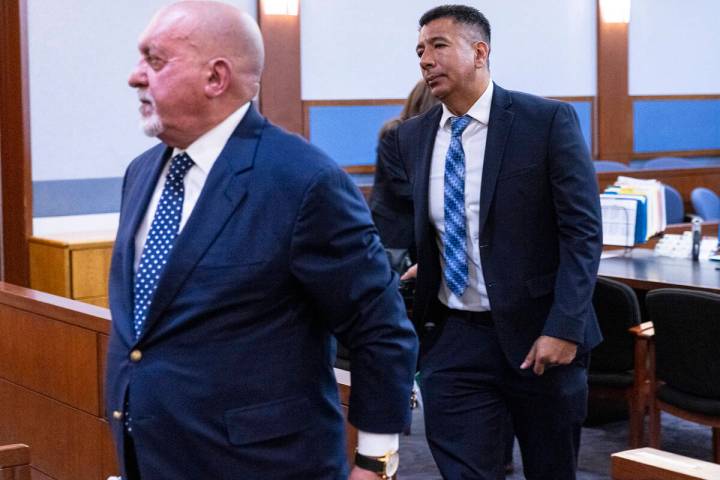 Former Alpine Motel Apartments owner Adolfo Orozco, right, leaves the courtroom with his attorn ...