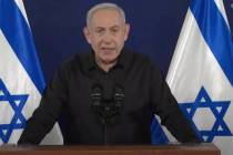 Israeli Prime Minister Benjamin Netanyahu delivers a statement from Tel Aviv addressing the Isr ...