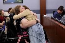 Amber Reedy hugs her daughter Isabella McPherson, 12, after Isabella gave a victim impact state ...